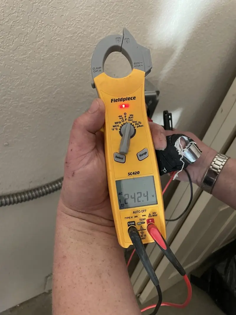 Voltage testing with clamp meter during Electrical Installation Services in Palmdale
